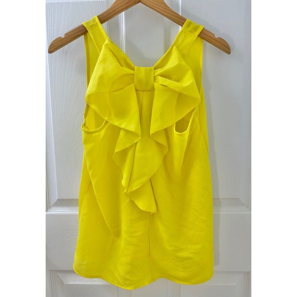 Womenโs Boutique Yellow Lightweight Flowy Loose Blouse w/ Bow Ruffle Back Detail